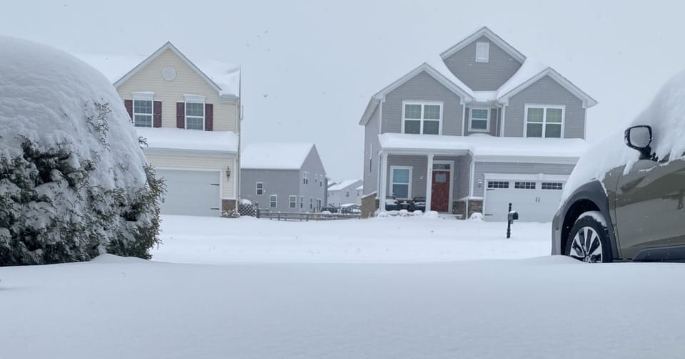 16 inches of snow covering a residential street in southwest O